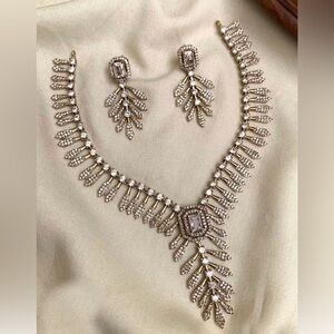 Elegant Gold and Diamond Necklace and Earring Set
